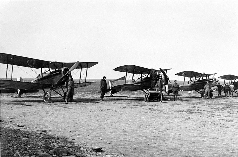 Line up of 'C' Flight S.E.5As with pilots and ground crew, C9539 (2nd) and B101 (3rd).
2 Squadron, A.F.C., 
Savy, March, 1918, 
 via Mike Mirkovic.