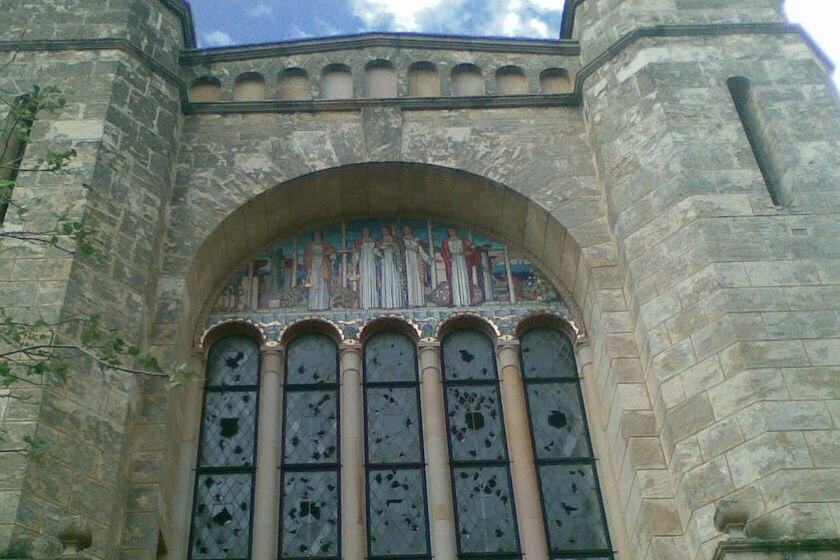 The smashed in windows of Winthrop Hall at the University of Western Australia