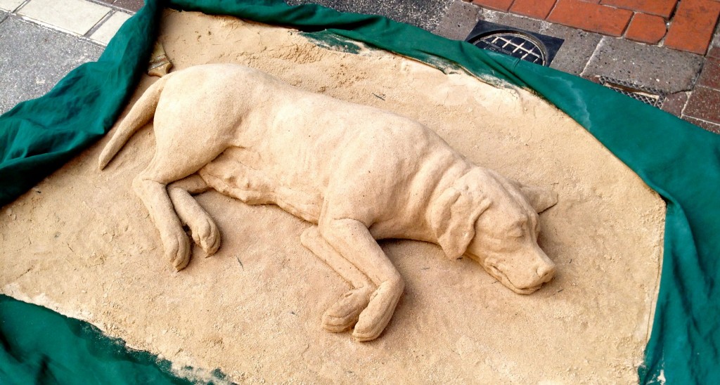 Among the buskers and performers, there was one man doing these sand sculptures of dogs. Beautiful work.