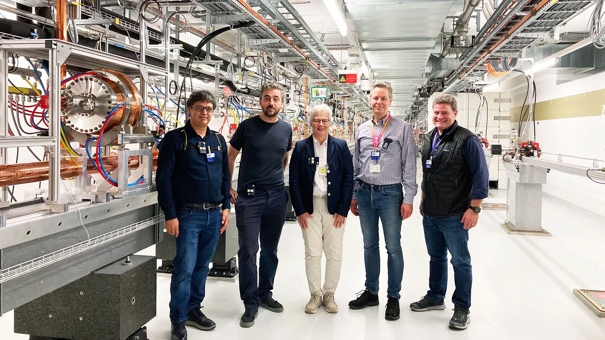 In the accelerator hall of SwissFEL: (L to R) Carlo Vicario, Eduard Prat Costa, Anne L’Huillier, Christoph Bostedt and Adrian Cavalieri.