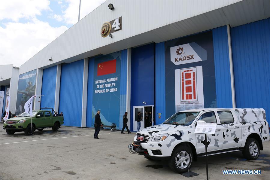 People walk into the pavilion of China at the Kazakhstan Defense Exhibition in Astana, capital of Kazakhstan, May 23, 2018. Seven Chinese military trade companies took their best products to participate in the exhibition held in Kazakhstan from May 23 to 26. (Xinhua/Aibek Abilov)