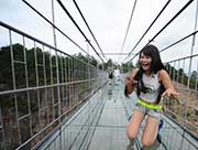 First Glass Suspension Bridge in China Opens to Visitors