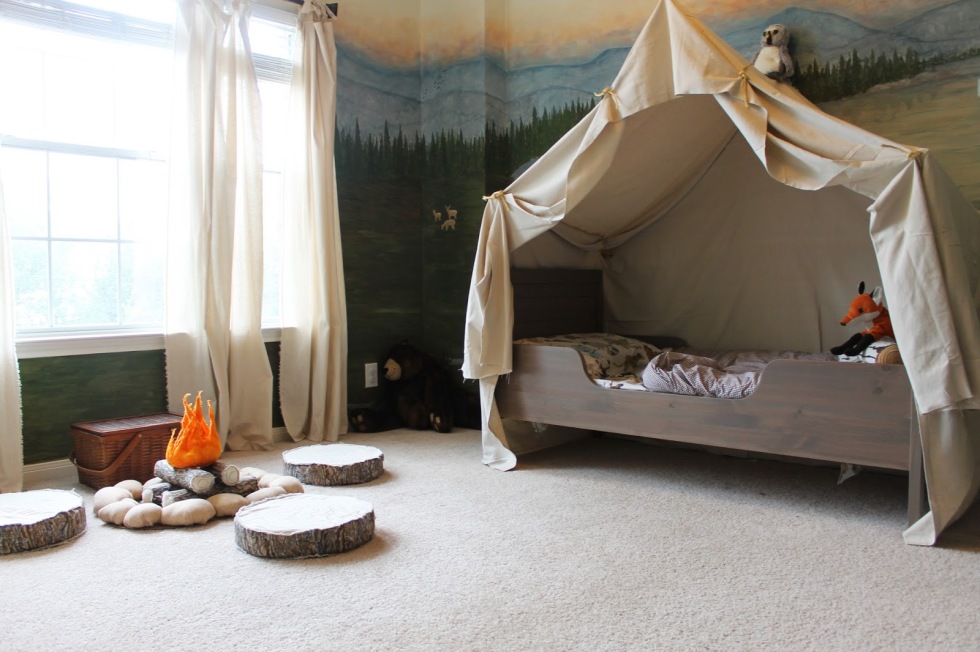 This isn't your average canopy: A dramatic drape turns a twin-sized bed into the comfiest tent ever while a pretend fire makes for the perfect gathering place for sharing ghost stories, songs, and snacks. Finish off with plenty of snuggly flannel blankets for a cozy campfire feel.
See more at The Ragged Wren »