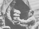 Bread produced by field bakeries being distributed to the 'cooks'.