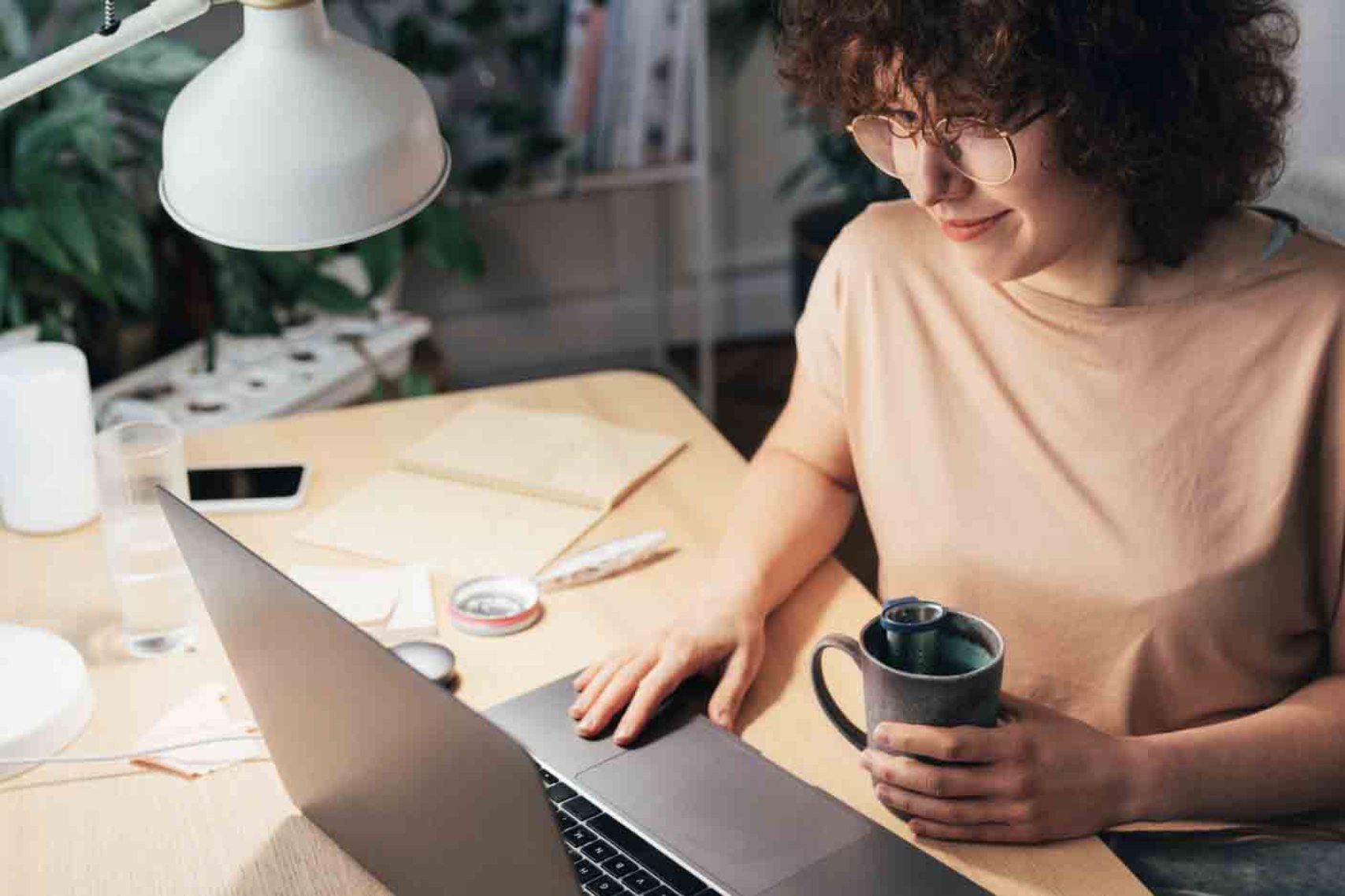 A woman working in her house