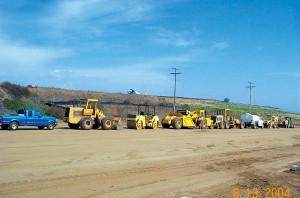 Work at the airpark required graders, concrete pumpers and numerous other pieces of heavy equipment. Here, some of the equipment is lined up in preparation for hundreds of hours of grading and other work.