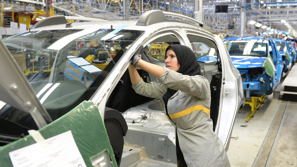 An employee of the French Renault group in Morocco works on a production line at the Renault factory of Melloussa, near Tangier…