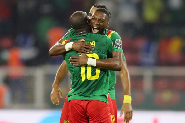 cameroon celebrate after winning a football match