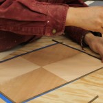 Cutting a veneer border with a chisel