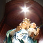 Statue of virgin and child illuminated from above