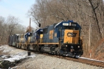 CSX 8664 leads an eastbound load of auto racks and parts just west of MD Route 97