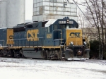 CSX 6921 works on building a train in the snow on the Memphis Line just south of the yard 1/28/09