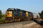 CSX 8664 and 8803 lead Q335 west into Grand Rapids