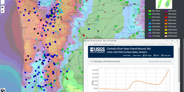 Screenshot of the National Water Dashboard mapping multiple gages in flood stage and more expected rainfall.