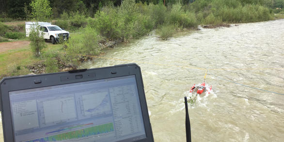 Measuring streamflow on St.Regis River at St Regis