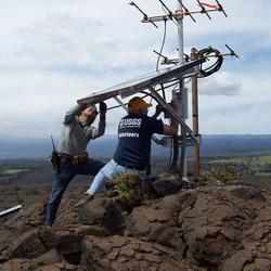 Image: Installing Antenna and Solar Panel for Seismic Station