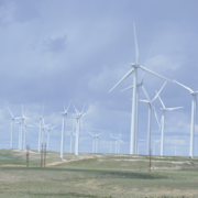 Wind turbines with blue sky in background