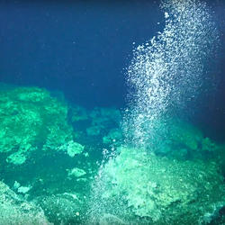 Image shows methane bubbling up from the seafloor