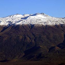 Mauna Kea Volcano, Hawai‘i viewed from the south. Prominent cinder ...