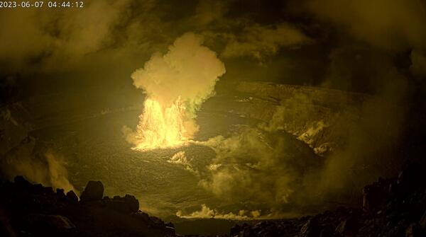 Color photograph of eruption beginning