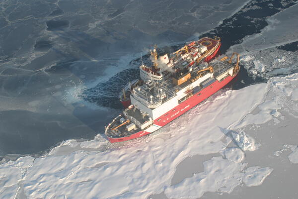 Aerial photograph of a Canadian and a US ship in the Arctic Ocean