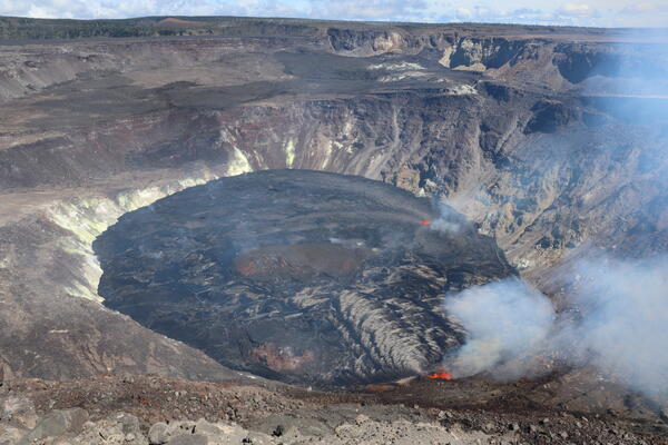 A wide view of the lava lake in Halema‘uma‘u crater, at the summit of Kīlauea, taken from the western crater rim