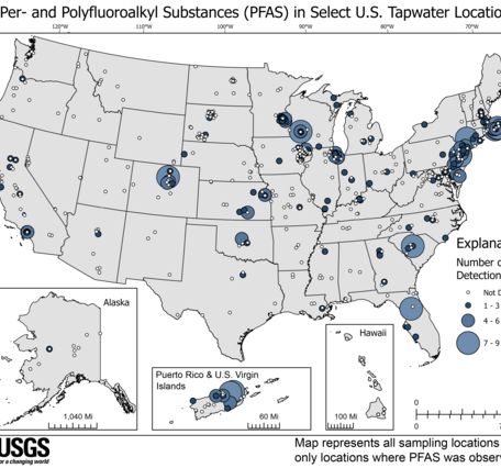 A USGS map of the U.S. with dots representing tap water sample sites across the nation, varying in size and shade of blue to 