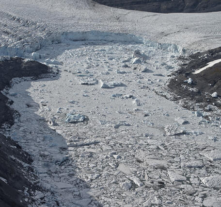 Calving of Snow River Glacier in early September 2015, resulted in icebergs floating in Snow River Lake.