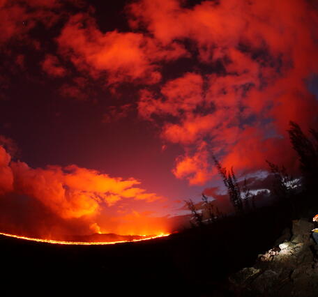 This is a photo of a fissure 8 lava roiling in the vent and feeding a pulsing channel.