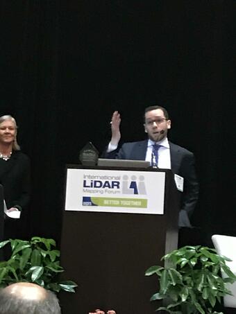 Mike Tischler of the USGS accepts the ILMF LIDAR award