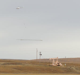 helicopter with survey equipment