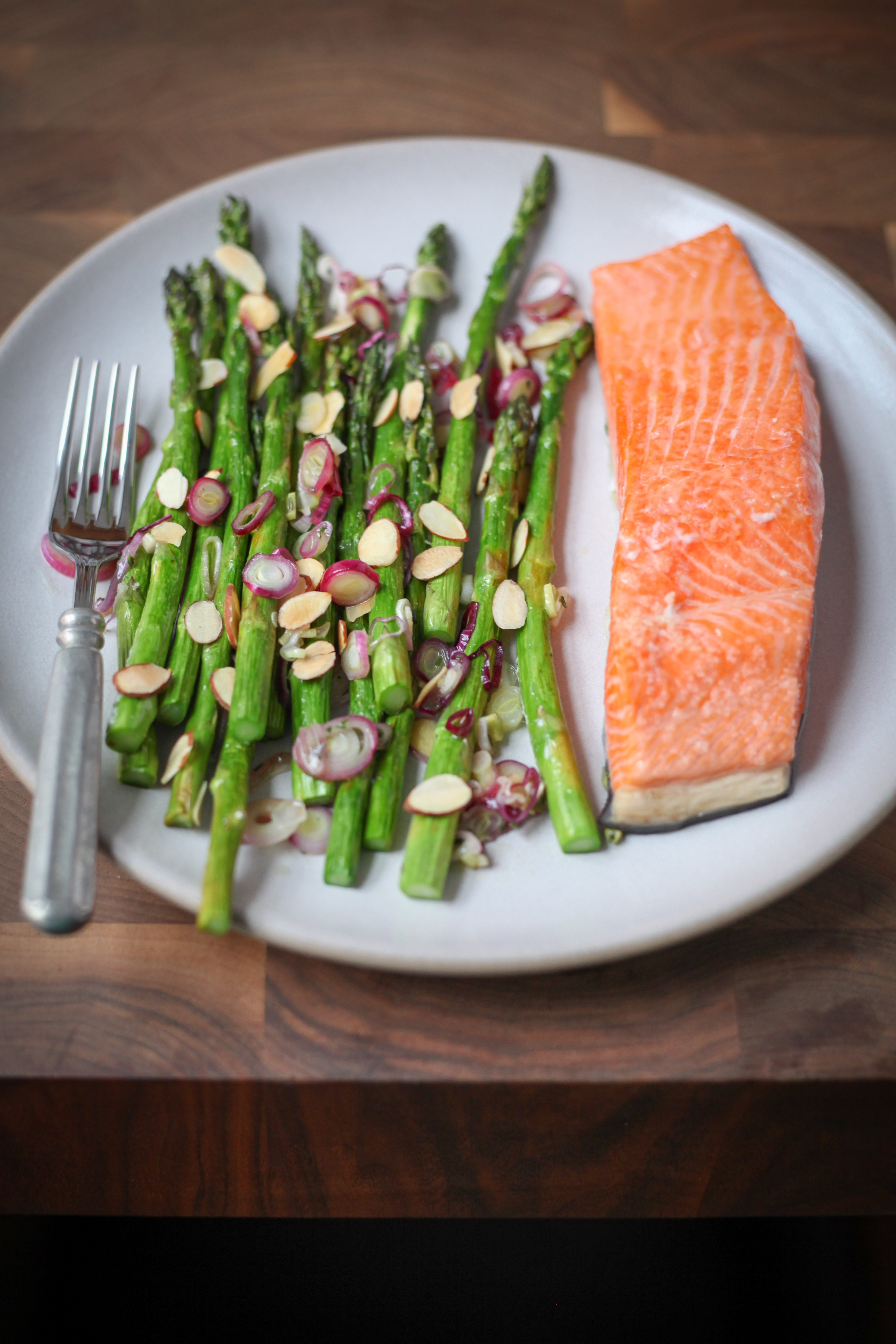 One-Pan Salmon With Asparagus, Spring Onions, and Almonds | amodestfeast.com | @amodestfeast