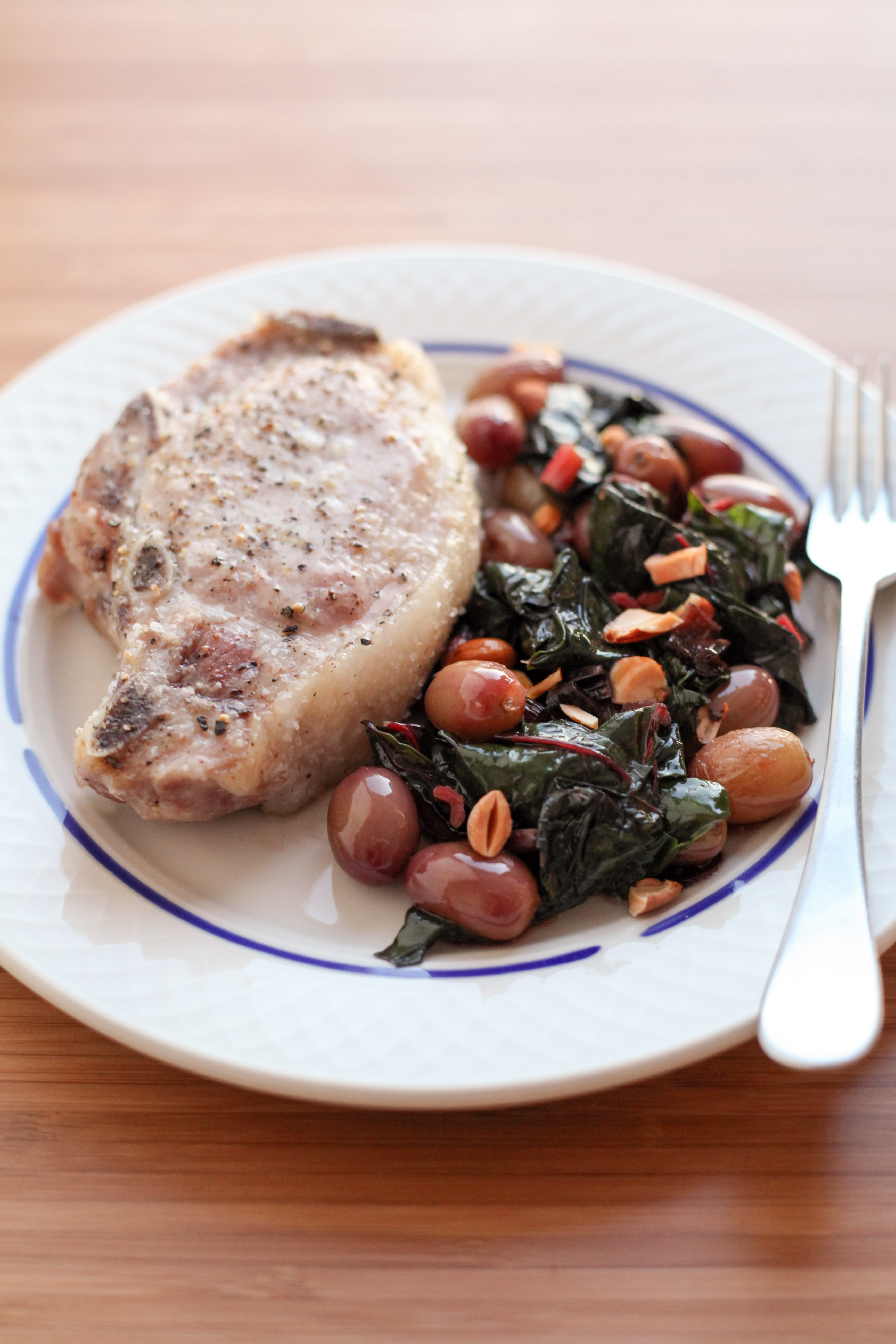 One-Pan Pork Chops With Grapes and Swiss Chard | amodestfeast.com | @amodestfeast