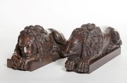 A Pair Of Carved Hardwood Lions