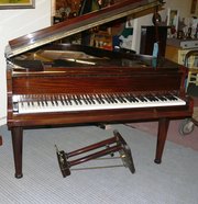 Piano By Rogers.