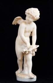 Alabaster Sculpture Depicting Cupid. 19th Century.