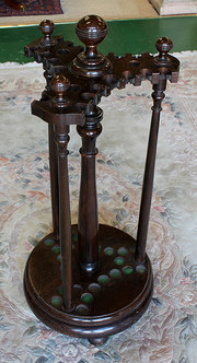 Mahogany Revolving Cue Stand.