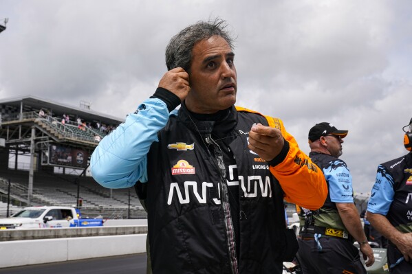 FILE - Juan Pablo Montoya, of Colombia, prepares to drive before the final practice for the Indianapolis 500 auto race at Indianapolis Motor Speedway in Indianapolis, Friday, May 27, 2022. (AP Photo/Michael Conroy, File)