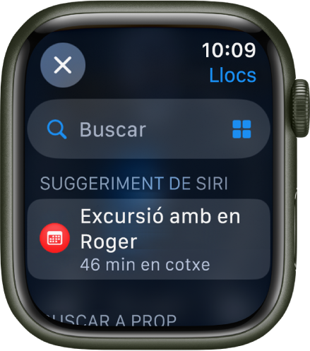 La pantalla Buscar de l’app Mapes, amb el camp de cerca cap a la part superior. A sota apareix un suggeriment de Siri. A la part inferior apareix una capçalera “Buscar a prop”.