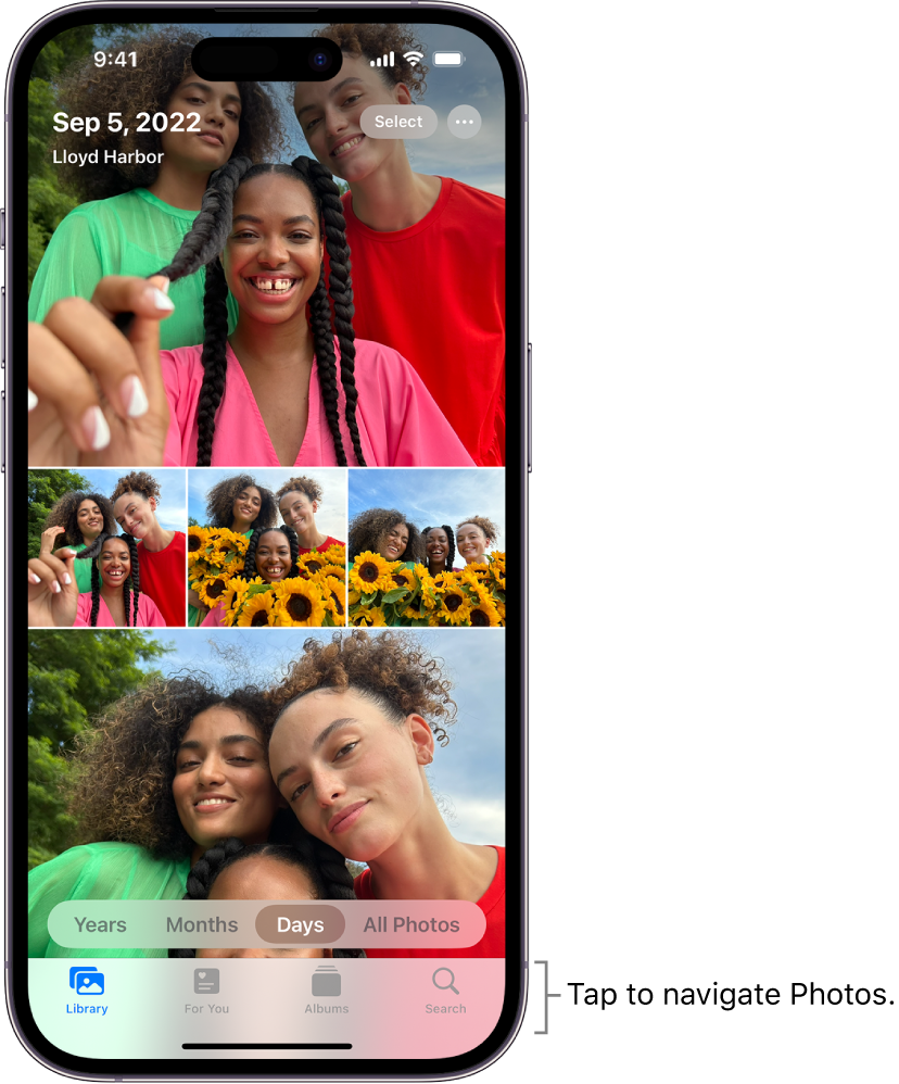 The photo library displayed in Days view. A selection of photo thumbnails fills the screen. In the top left of the screen are the date and location where the photos were taken. In the top right are the Select and More Options buttons to share photos and see details. Below the thumbnails are options to view the photo library by Years, Months, Days, and All Photos. Along the bottom are the Library, For You, Albums, and Search buttons.