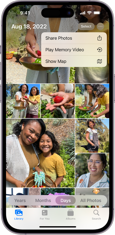 Photos ekrāns, bet ekrāna apakšā ir atlasīts elements Days. Ekrāna augša ir atvērta opciju izvēlne More, kurā redzamas opcijas Share Photos, Play Memory Video un Show Map.