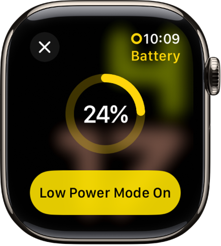 „Low Power Mode“ ekranas su daliniu geltonu žiedu, nurodančiu likusį įkrovimą. „Low Power Mode On“ mygtukas yra apačioje.