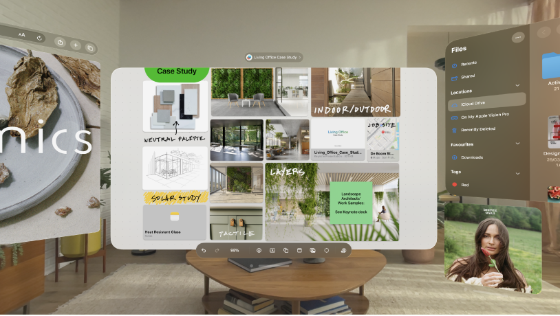 Multiple apps open on Apple Vision Pro, arranged in front of and around the user.