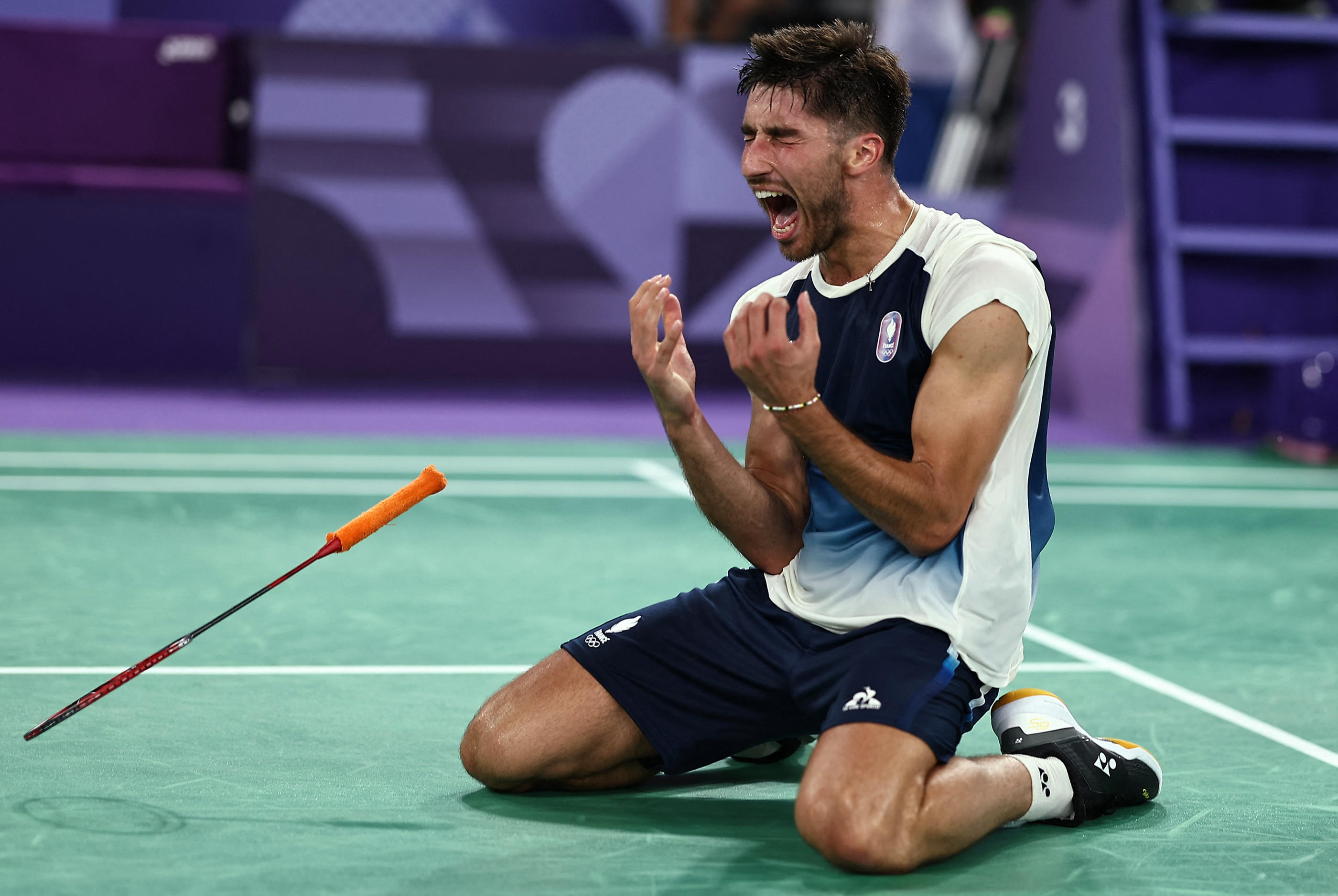 Toma Junior Popov est ivre de bonheur. Après un long combat de près d'une heure et demi, il se qualifie pour les 8es de finale de la compétition. Reuters/Ann Wang