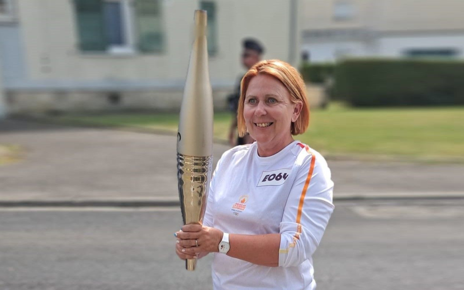 Notre journaliste Sandrine Lefèvre porte la flamme, à Creil (Oise), le jeudi 18 juillet 2024. DR