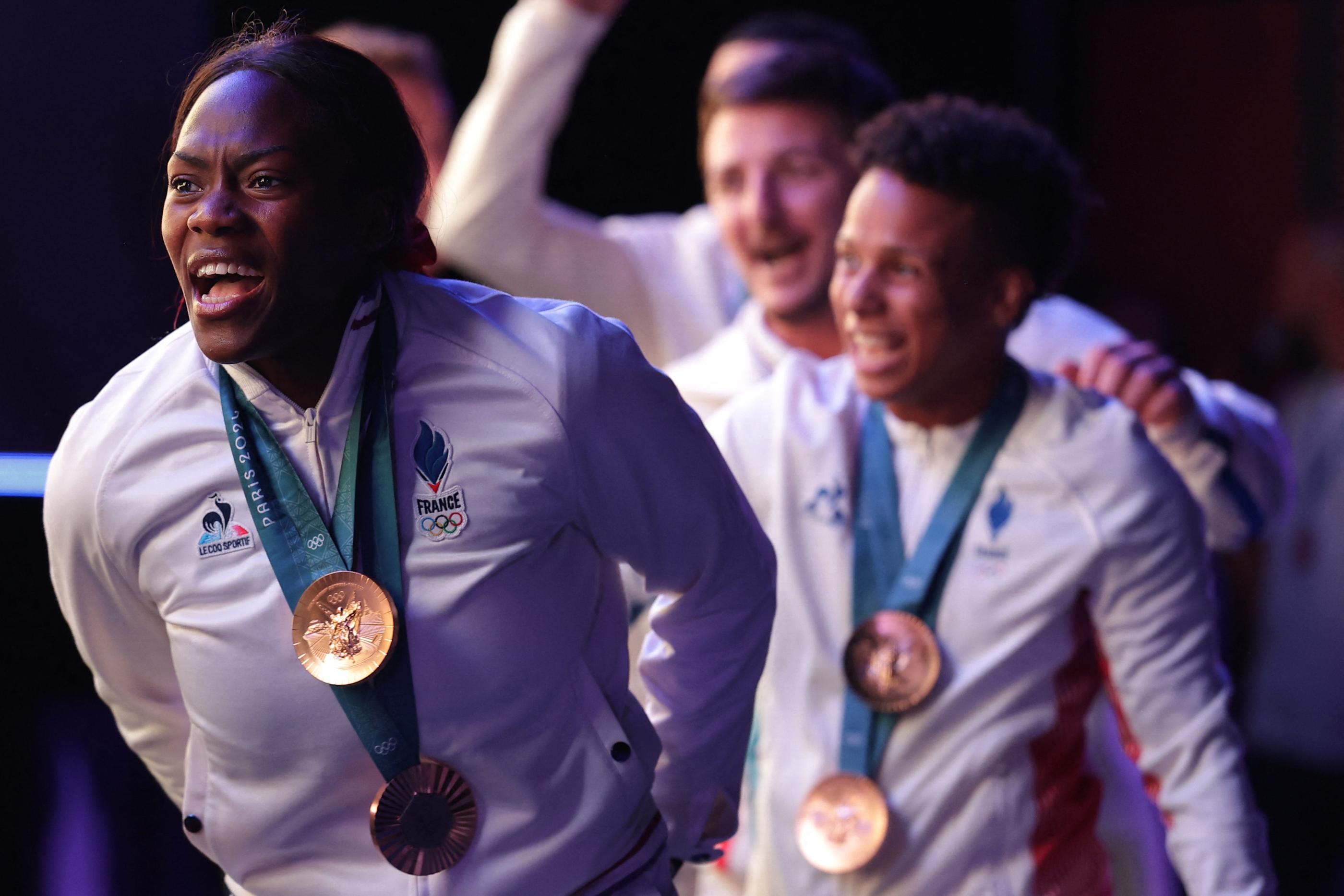 Clarisse Agbégnénou a célébré ses deux médailles au Club France avec l'équipe de France. (Photo by Valentine CHAPUIS / AFP)