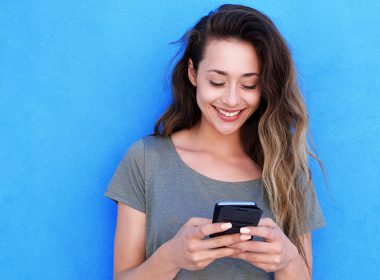 woman holding phone