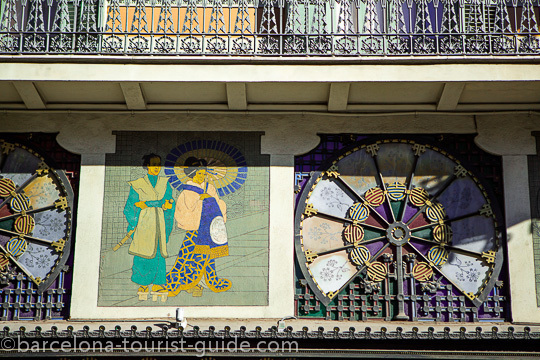 Japanese art on the walls of a building on Las Ramblas