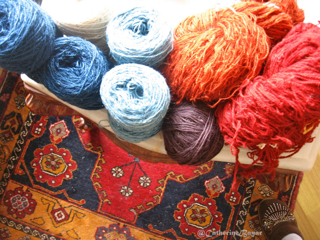 The hand dyed wools to create these handcrafts, whether carpet or handknit