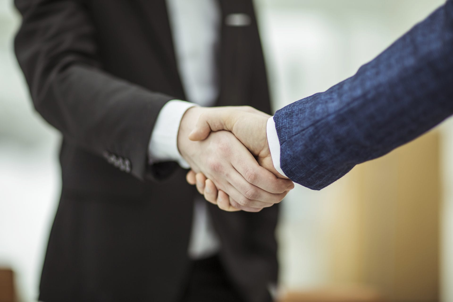 Two men handshaking